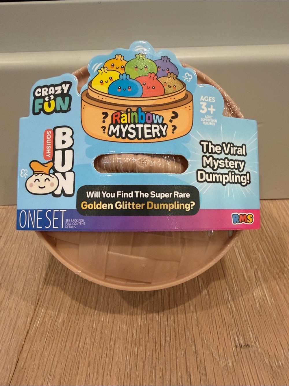 Original Rainbow Mystery Dumpling Squishy Bun - New in plastic